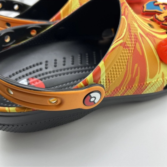 Crocs Pokémon Charizard cls Clog Size M9 / W11 210242-001 in Orange.
